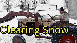 Pushing Snow After First Snowfall on Homestead