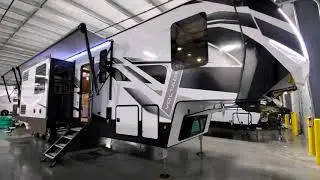 Model Change 2021 Voltage 4225 Toy Hauler Fifth Wheel Couchs RV Nation a RV Wholesaler Walk through