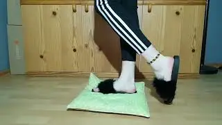 Fur slides and barefeet trample pillow 