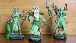 Ancient forest elves miniatures from modeling clay