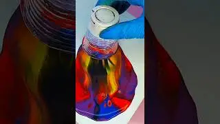 Pouring acrylic paint on canvas