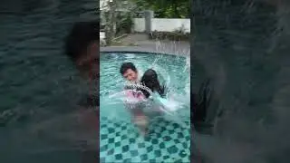 SAMANTHA AND PAPA SWIMMING IN THE POOL