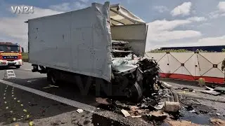 VN24 - Driver's cab is pressed onto the loading area in truck accident