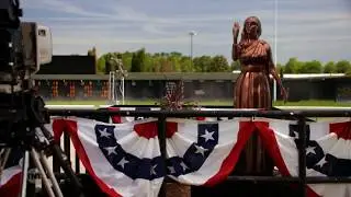 Woman to Statue