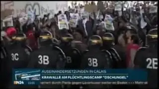 Frankreich: Krawalle von Flüchtlingen in Calais. Polizei setzt Tränengas ein.