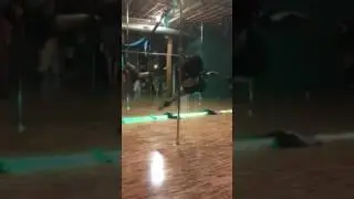 Pregnant pole dancer