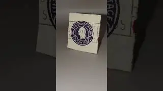 US Stamp, George Washington embossed 3c purple Postage Stamp from an envelope