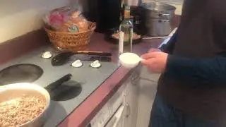 Adding white wine to the pot