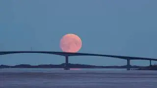 Moon over bridge timelapse