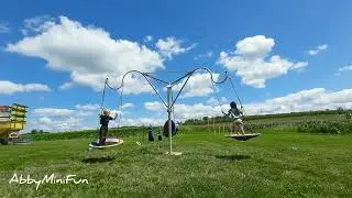 Abby with Amish kids enjoying the swing