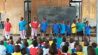 Father Henry Simaro and the African Child Foundation Fanaka School                     kids dancing