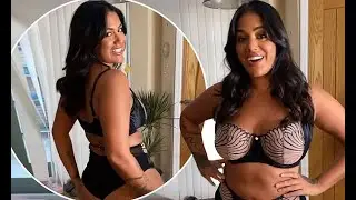 Malin Andersson displays her sensational curves in black lingerie