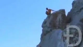 прыжок со скалы насмерть.