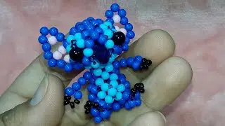 Llavero stich hecho con perlas