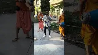 Street musician tries to learn Hare Krishna Mahamantra in Barcelona Spain