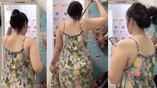 Mother in a Flowery House Dress with a Stunning Body