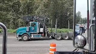 Skadil Todd doing the self loader logging truck thing.