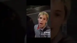 guy with milkshake in parking lot screaming for help