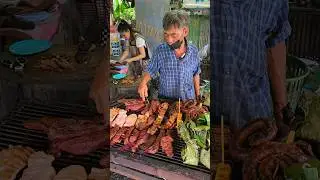 Uncle sells grilled meat. It sells very well. Chiang Mai, Thailand. #streetfoood #shorts