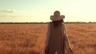female enjoys walk at country side | 4K Footage
