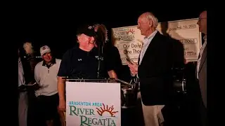 Robert Firkins receives the LECOM Leadership Award at the 2023 Bradenton Area River Regatta Gala
