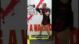 Jon Jones style “Fake takedown  - swing” 