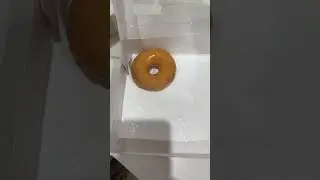 Krispy Kreme donut with coffee
