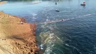 Flood gates open at bagnell dam into Osage river.