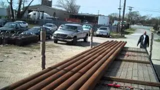 Load of Pipe Unloaded by a GENUS