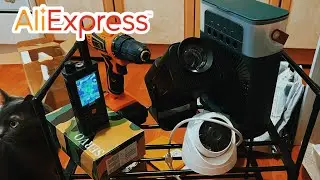 Seven large packages from Aliexpress. Camera, projector, screws and more