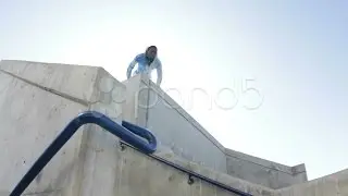Man Parkour Jumps Off Stairs Towards Camera. Stock Footage