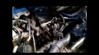 Removing the fuel injection pump from a Mitsubishi Pajero III with a 4M41 engine.