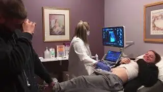 Dad Bonds with Unborn Baby in Magical Moment