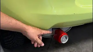Sporty Sound: Transform Your Muffler with a Coca-Cola Can! 