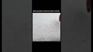 Qorli yuzada sehrli teginish bilan mukammal doira yaratadi