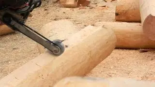 Прохождение пазов сруба дебаркером