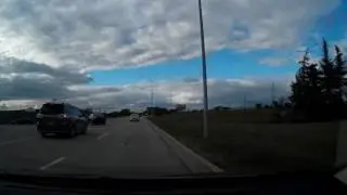 Toronto Dashcam : Toyota Sienna nearly runs me into curb