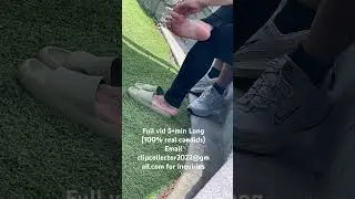 Candid shoeplay in tan slides at the park