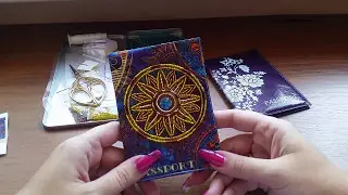 Passport cover embroidered with beads