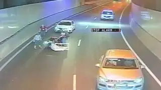 Motorcyclist's Death-Defying Tunnel Ride - Dangerous mattress on the road in Queensland, Australia