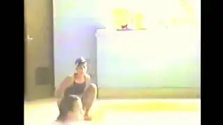 Amputee girl hopping at swimming pool