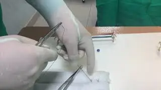 Sutura simulada con porta agujas
