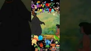 Маугли и Балу танцуют.