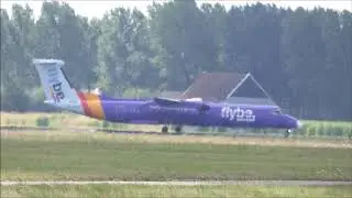 Flybe purple Dash8 Q400 taxiing to Polderbaan 36L
