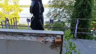 LadyIVE all leather outfit and high boots walks in the ruins od the hotel
