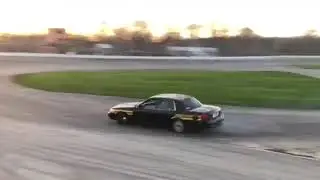 Crown Vic Hits Wall Drifting at Race Track