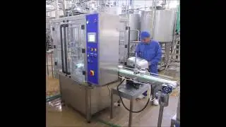 Автомат CFM2C для фасовки в стаканчики йогурта с джемом