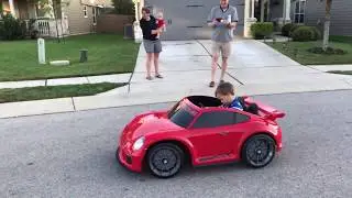 Penn gets his first car - Fisher-Price Power Wheels Porsche 911 GT3 Car