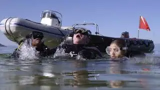 Beautiful Female Scuba Diver trapped underwater in Pipe