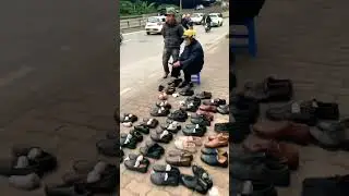 Wanna buy shoes 👞?? Selling them on street here - Pham Hung Street, Hanoi